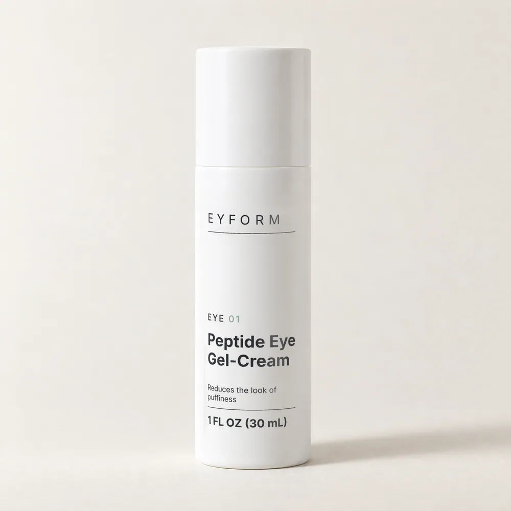 EYE 01 white airless bottle on an ivory backdrop